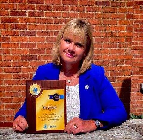 gill graham with award Gill Graham with award for excellence in homeopathy